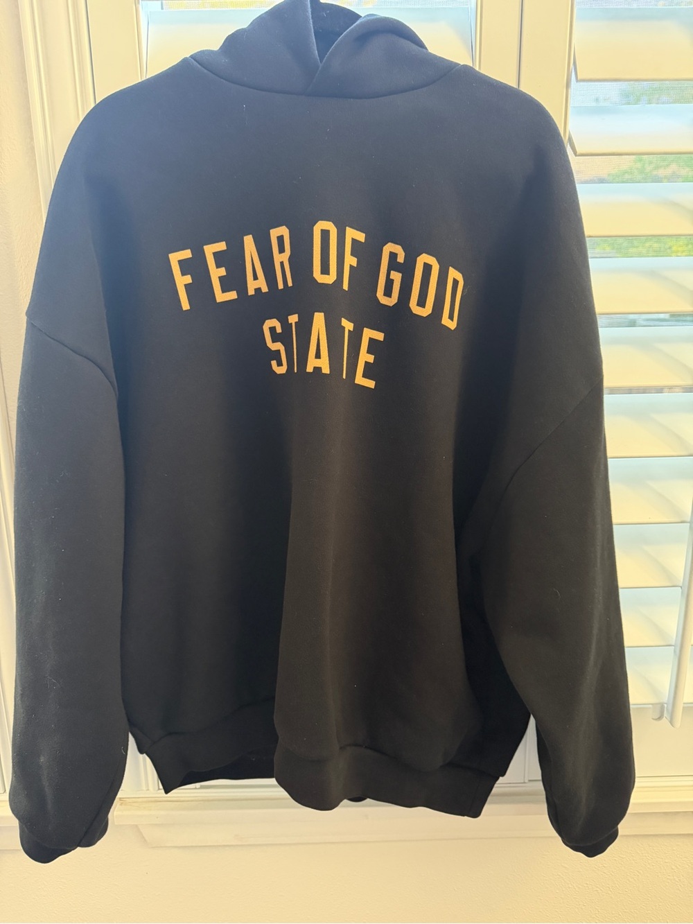 Essentials Black Crewneck Sweater with Gold Lettering